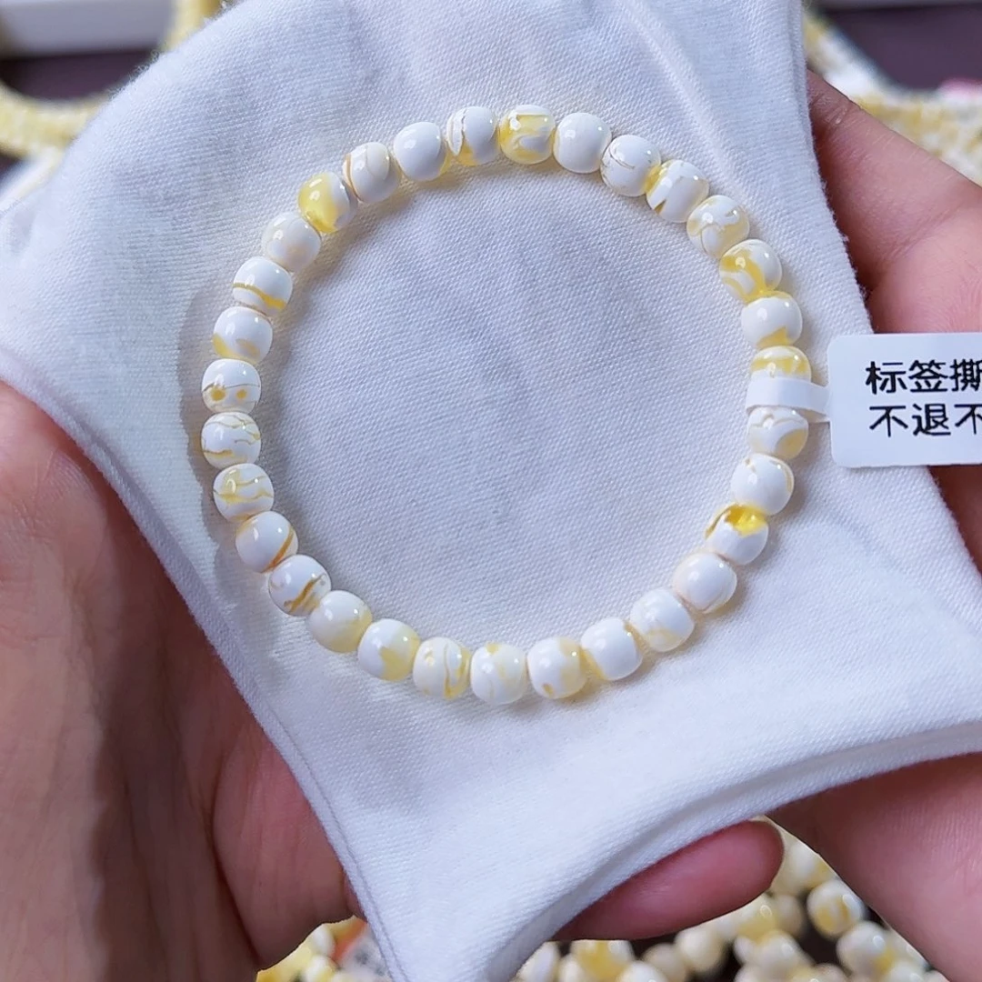 琥珀未镶嵌裸石6.5mm漆白闪电妖花