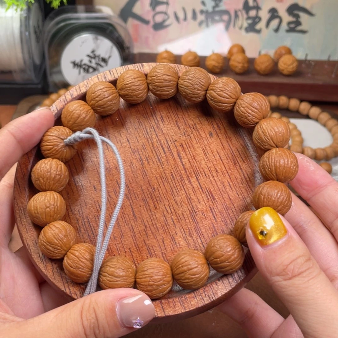 星***辰手串猴头核桃凤羽