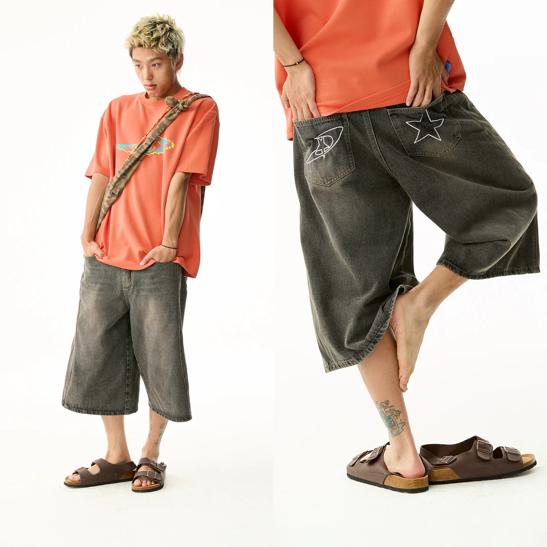 江南先生弧度分割链条刺绣铆钉喇裤复古黑色水洗牛仔中裤JN52C61