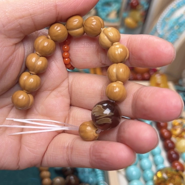 灵***芙猴头核桃手串在一起就