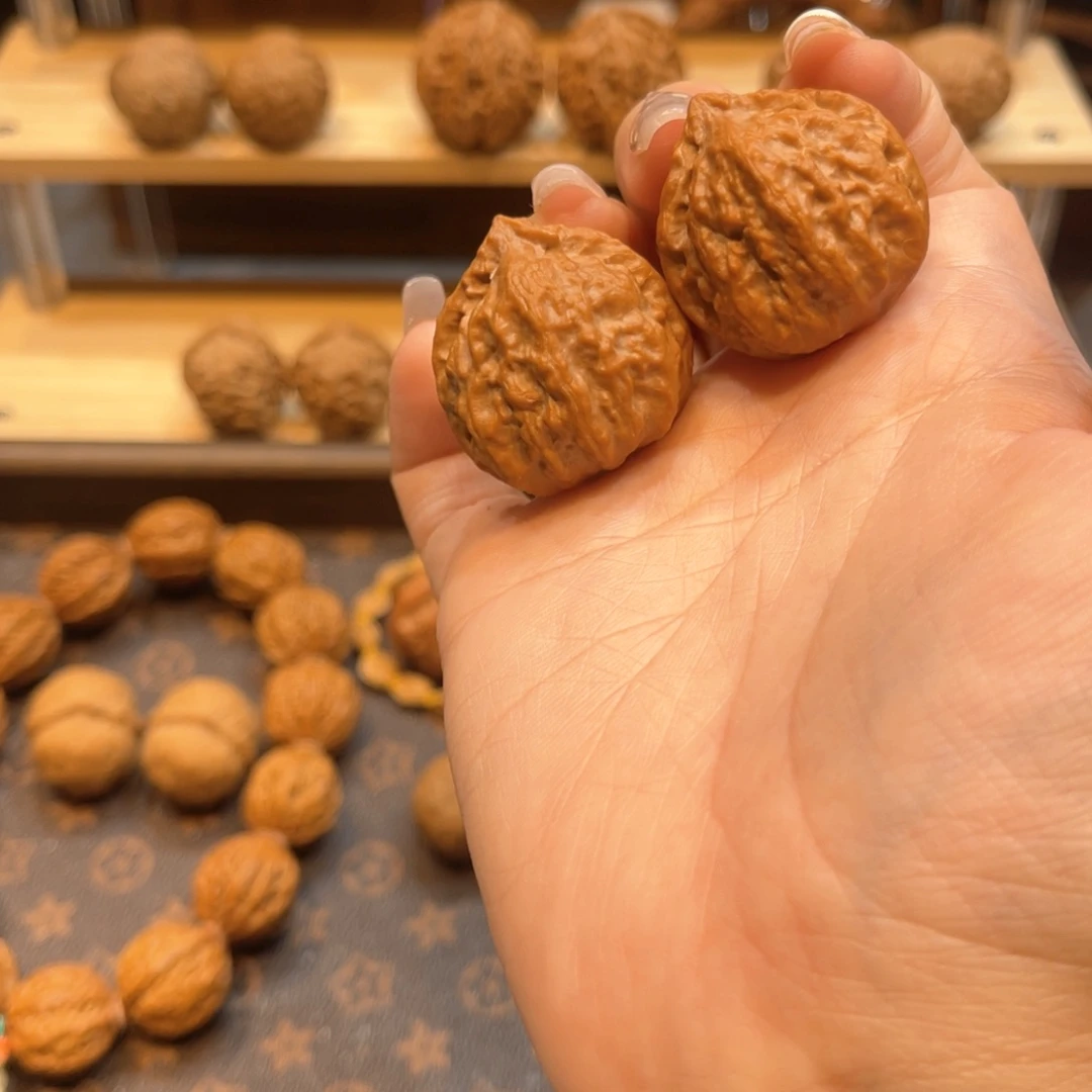 文玩核桃把件桃心流水纹