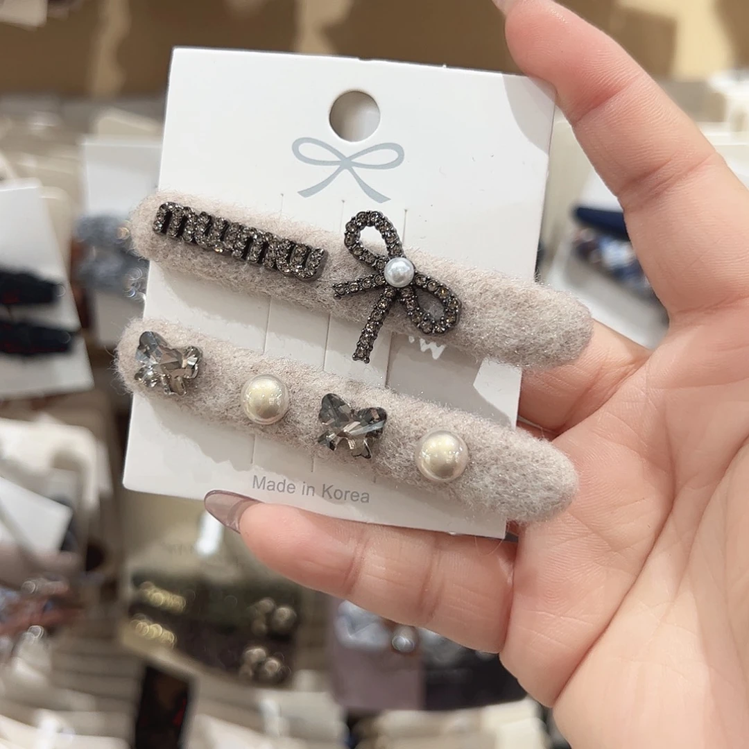 非金属米色珠珠蝴蝶结鸭夹一对