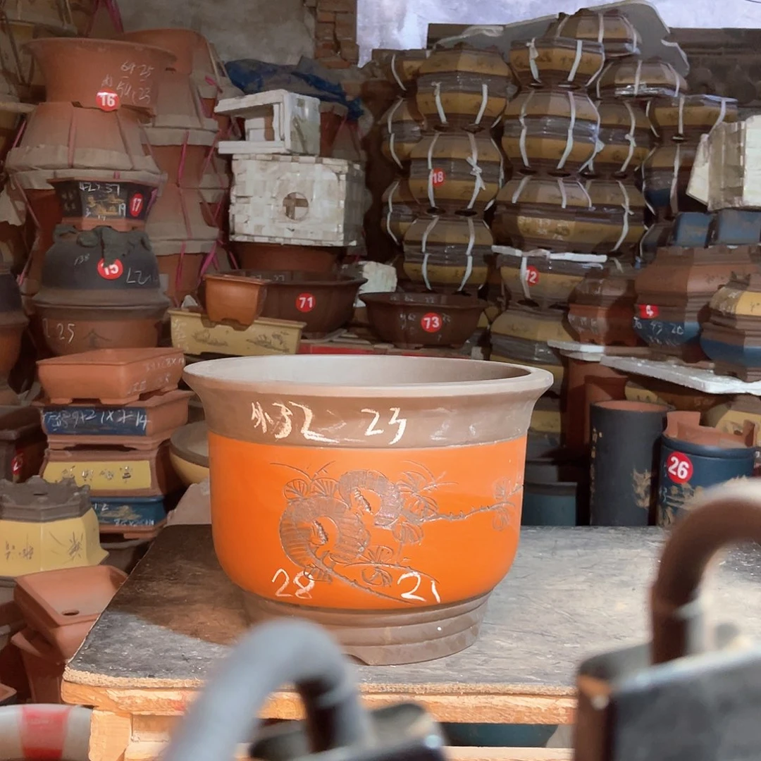 紫砂花盆金钟一个