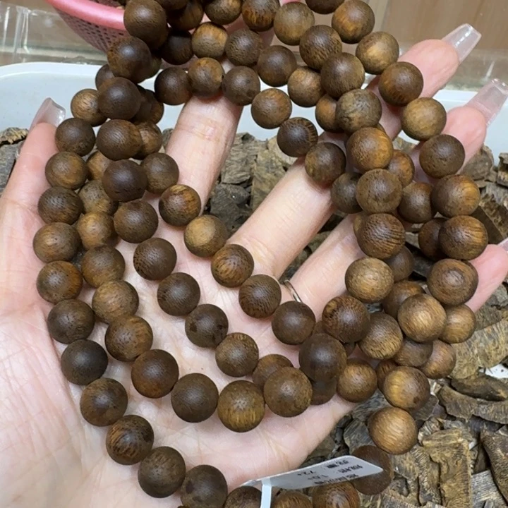 沉香手串白棋沉浮一条