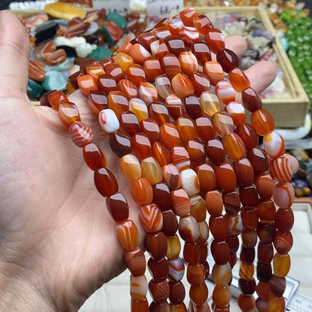 玛瑙/玉髓未镶嵌珠宝半成品一条天然8×12蚕丝红玛瑙纽纽桶珠