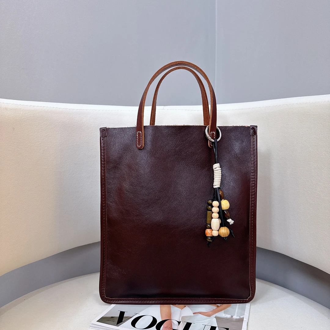 【优雅琴谱】树膏植鞣头层牛皮手提单肩斜跨时尚真皮女包#F813058