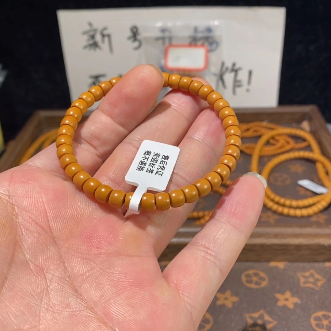 湛***蘭橄榄核手串/手链6.2橄榄核核尖单圈素串