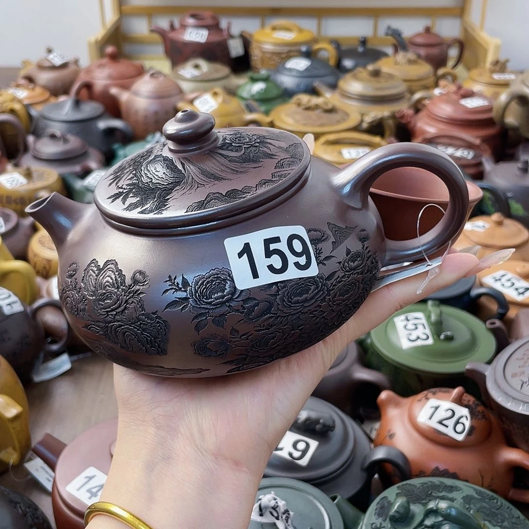 茶壶紫砂我**在紫砂微瑕