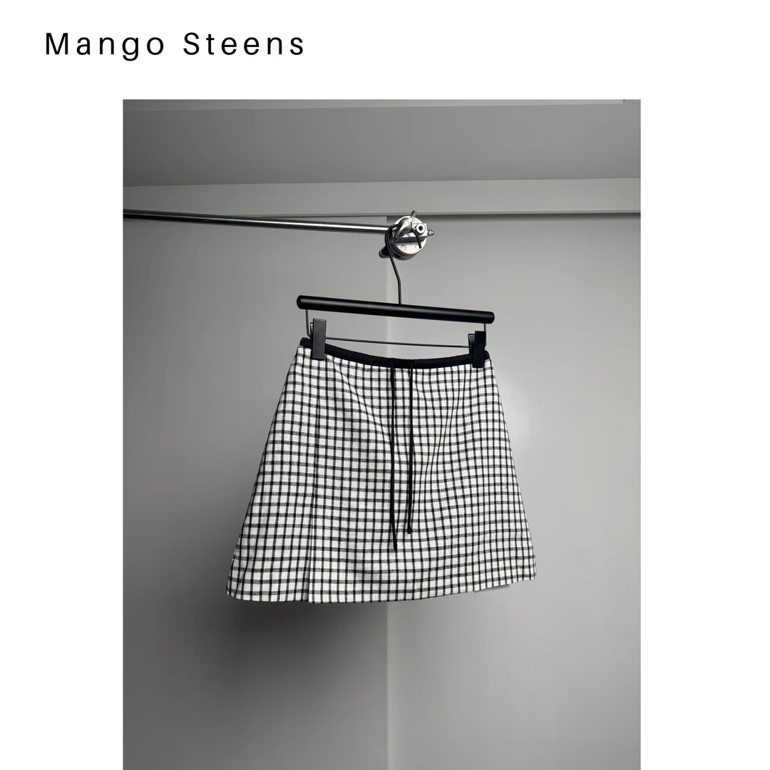 MANGO steen‘s丨亚麻A摆经典格子短裙J6117