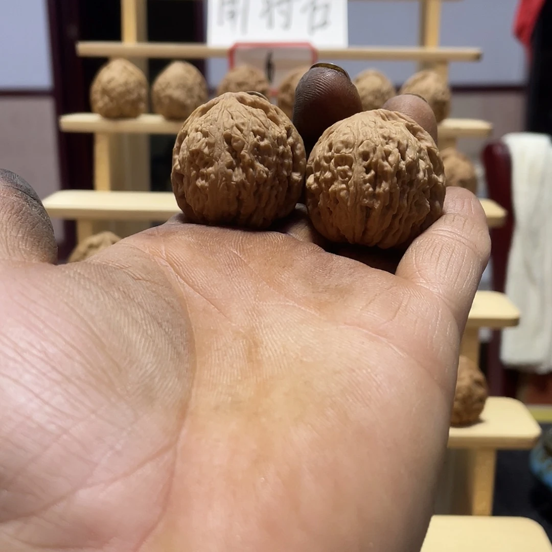 .***眼桃核吊坠文玩核桃南将石