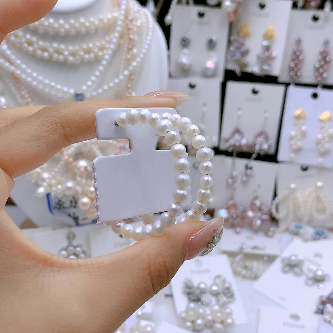 银S925镶嵌耳饰淡水珍珠y****e