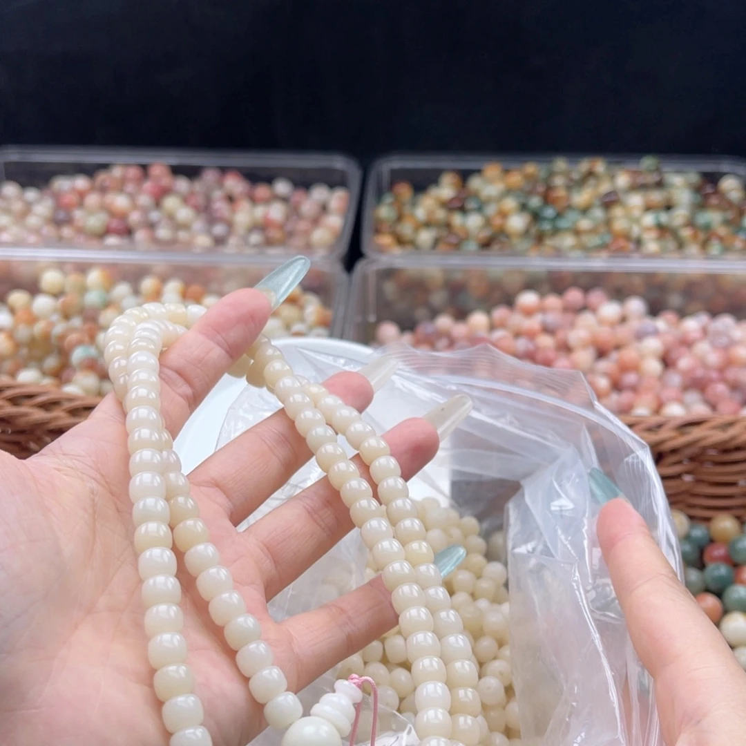 白玉菩提吊坠q6*7mm/100+10颗白玉