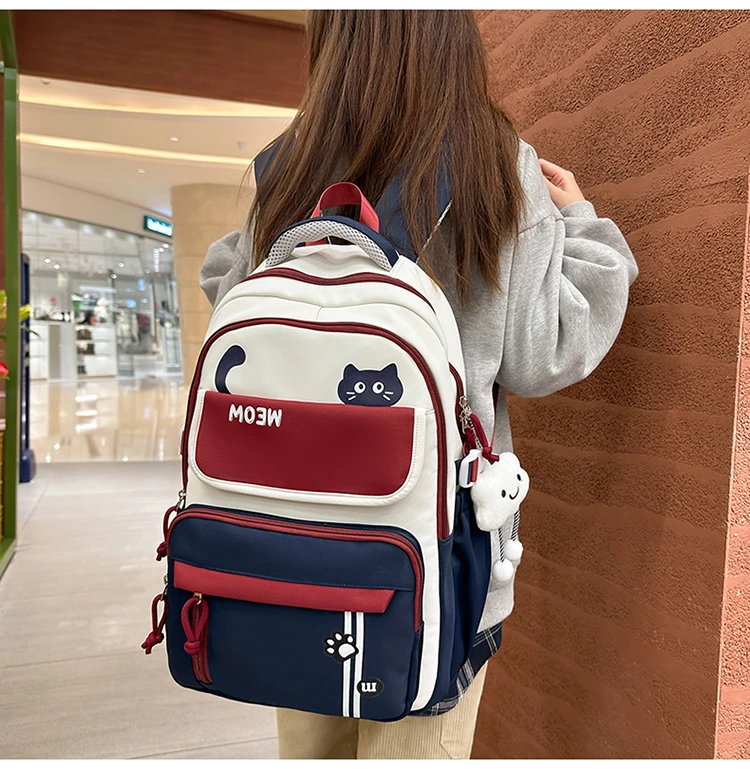 2025新款大容量高颜值小学初高中护肩护脊时尚百搭双肩背包轻便