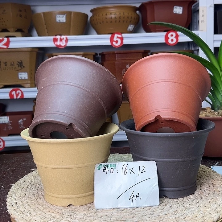 紫砂花盆蛇年大吉