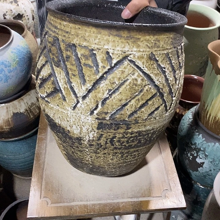 紫砂花盆口24高度30黑茶…？