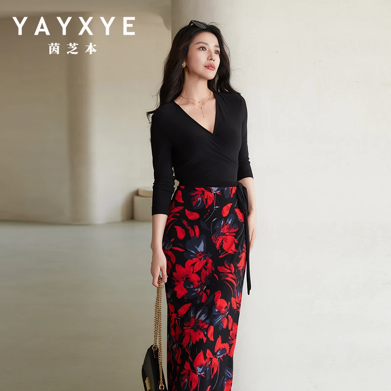 墨影花姿 2025年夏季新款黑色拼接裹身裙修身印花弹力度假连衣裙