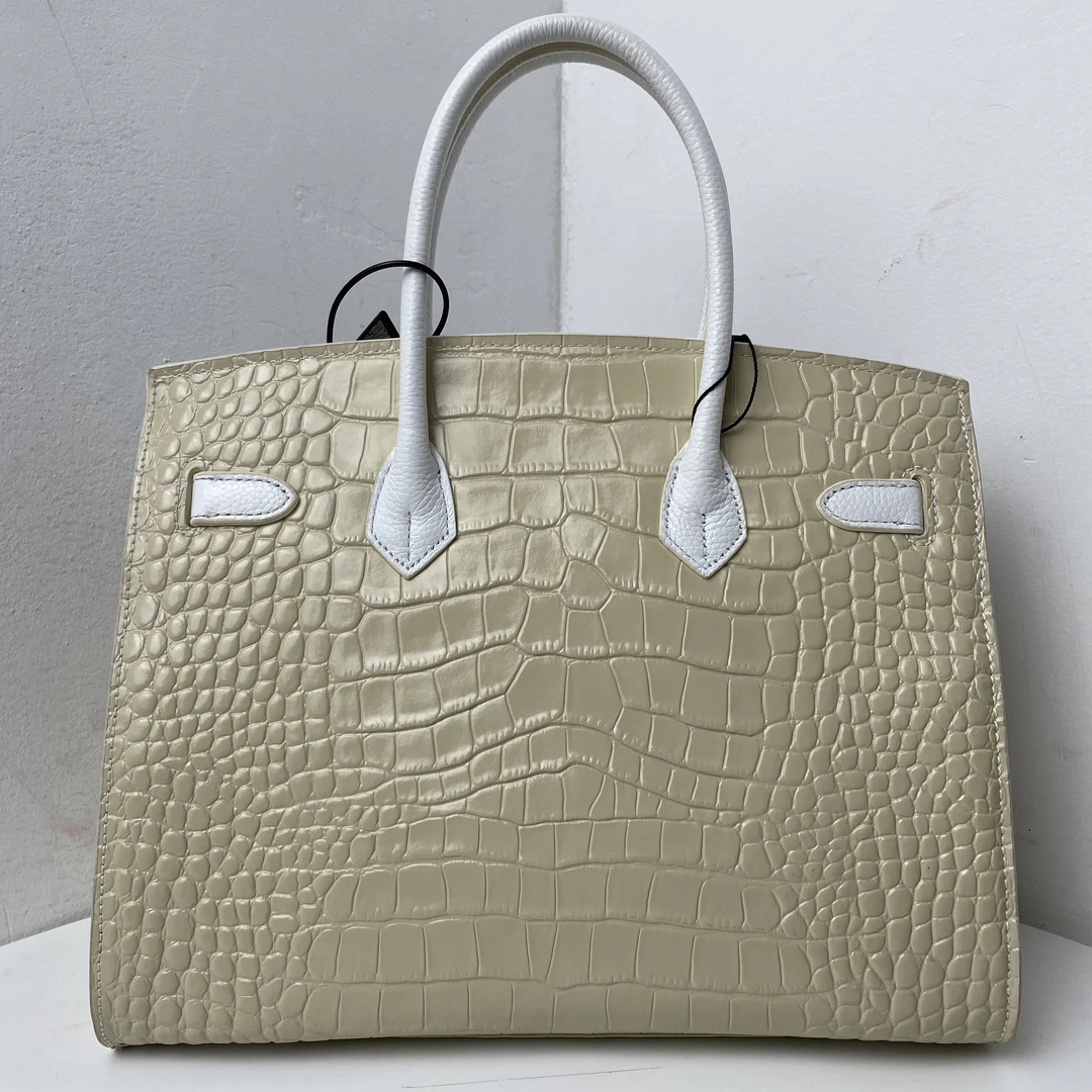 1627【赠小马挂件和雨衣袋】精品女包单肩斜挎