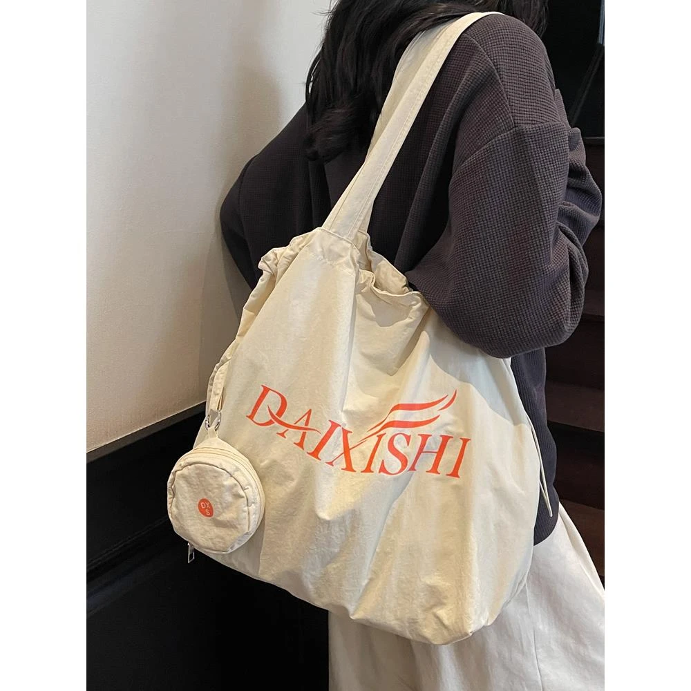 简约字母印花布包包女2025新款春季韩系百搭托特包大容量单肩包