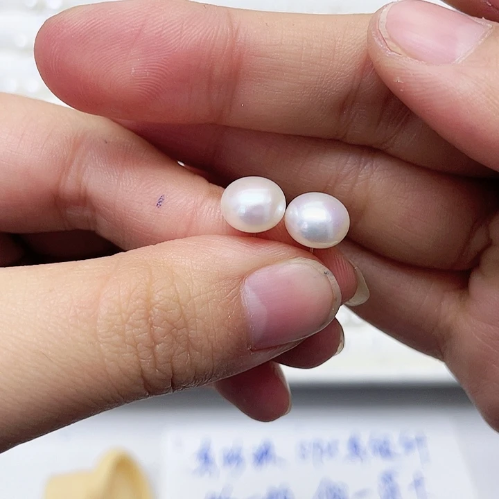 淡水珍珠耳饰银S925镶嵌易****田