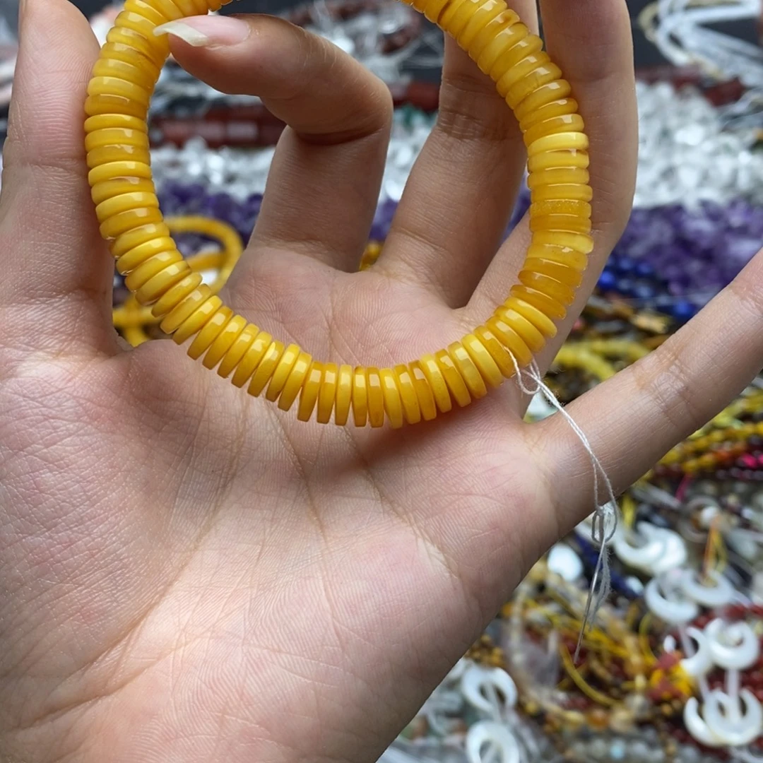卷***毛玛瑙/玉髓未镶嵌珠宝半成品一条纯天然蜜蜡直切隔片8.5mm