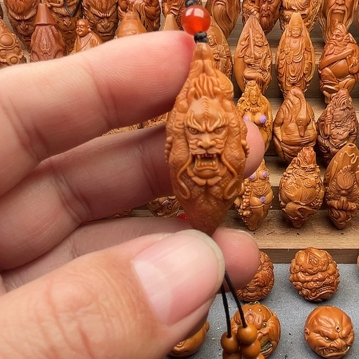 橄榄核吊坠19龙佛手