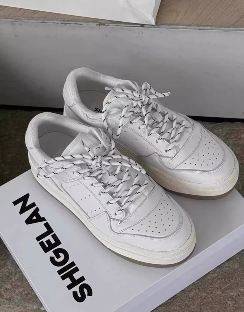 诗歌兰真皮小白鞋女2025春季新款时尚轻便百搭厚底增高休闲板鞋子