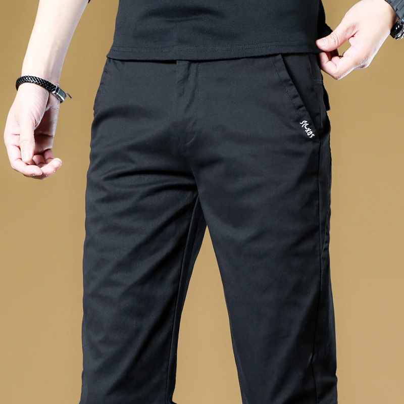 香港2025秋冬季新款黑色休闲裤男士修身直筒韩版潮流商务长裤子男