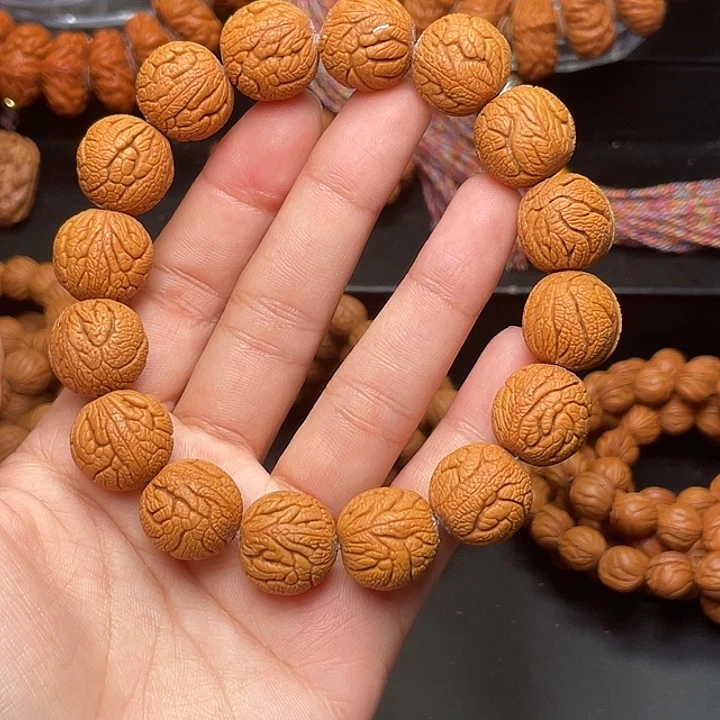 手串桃核金丝龙珠1.6