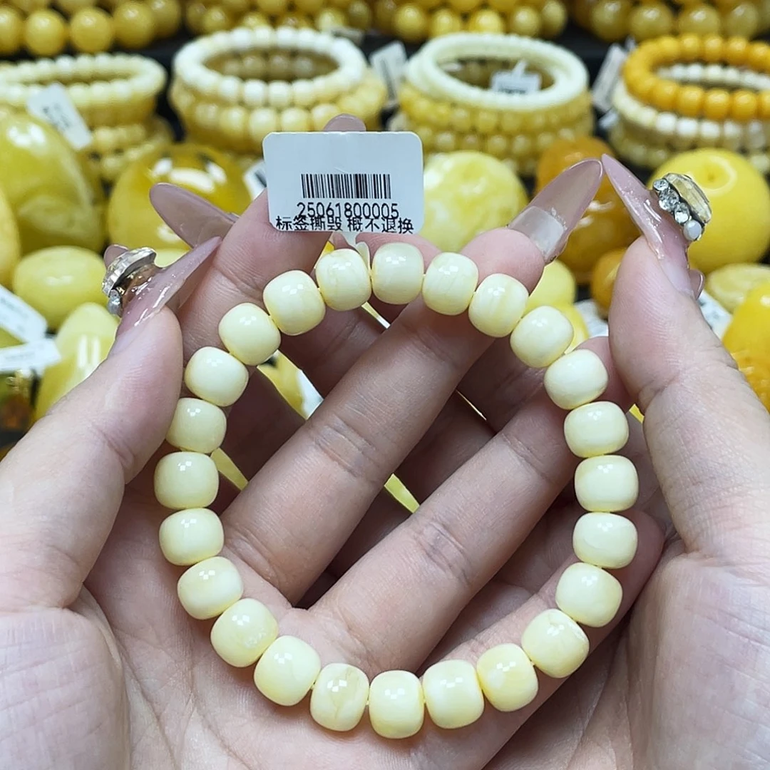 琥珀未镶嵌珠宝奇石9.6*8.3mm浓蜡奶白老型手串微瑕