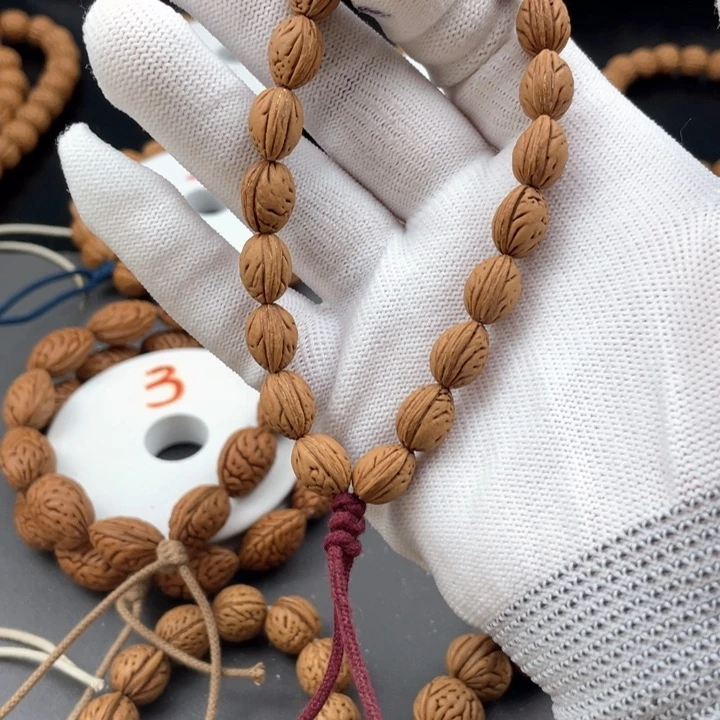 笑****0.9尺寸野生桃核手持