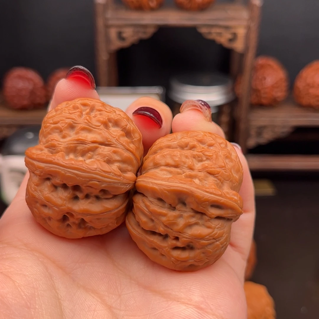 桃核把件胜*平谷一代元宝