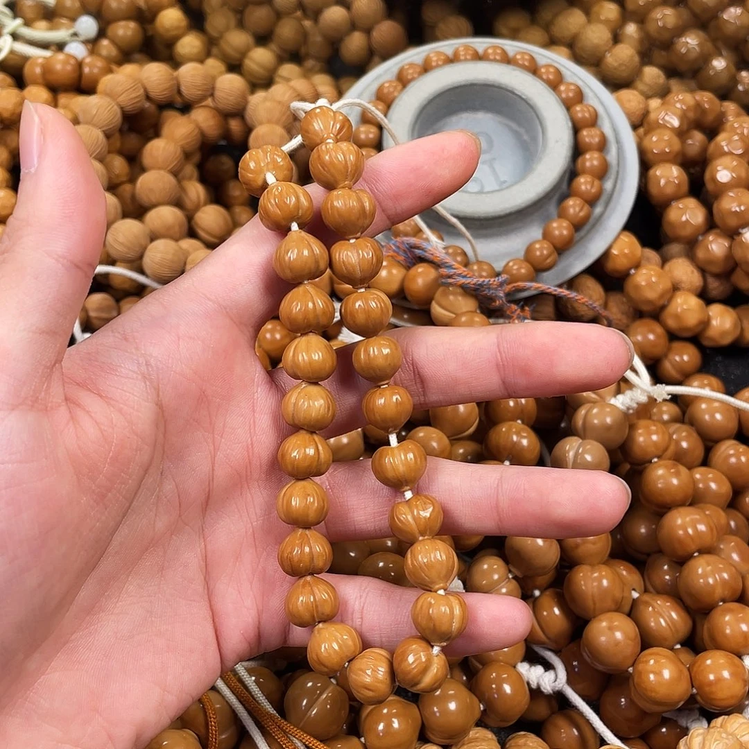 爱***鱼核桃手串/手链微瑕屁桃