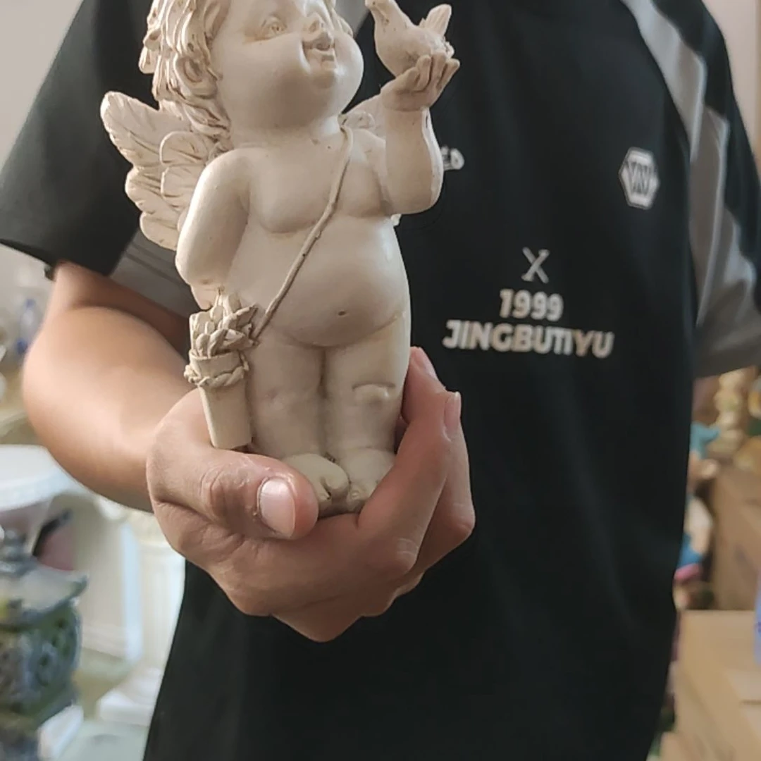 合成树脂拿小鸟小天使摆件