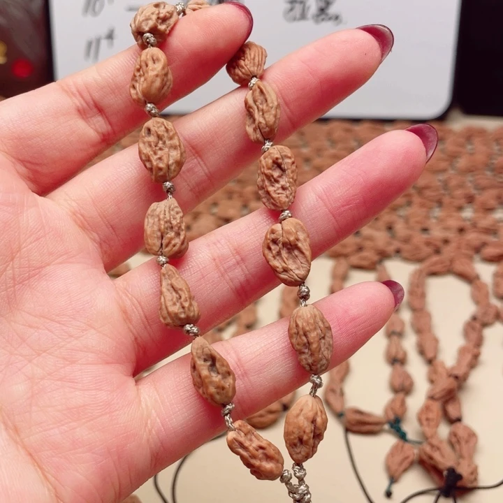 曹***生吊坠文玩核桃异形