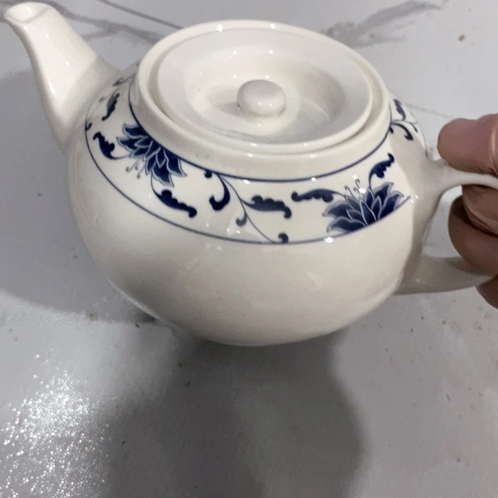 奔***奔瓷片强化瓷多孔壶