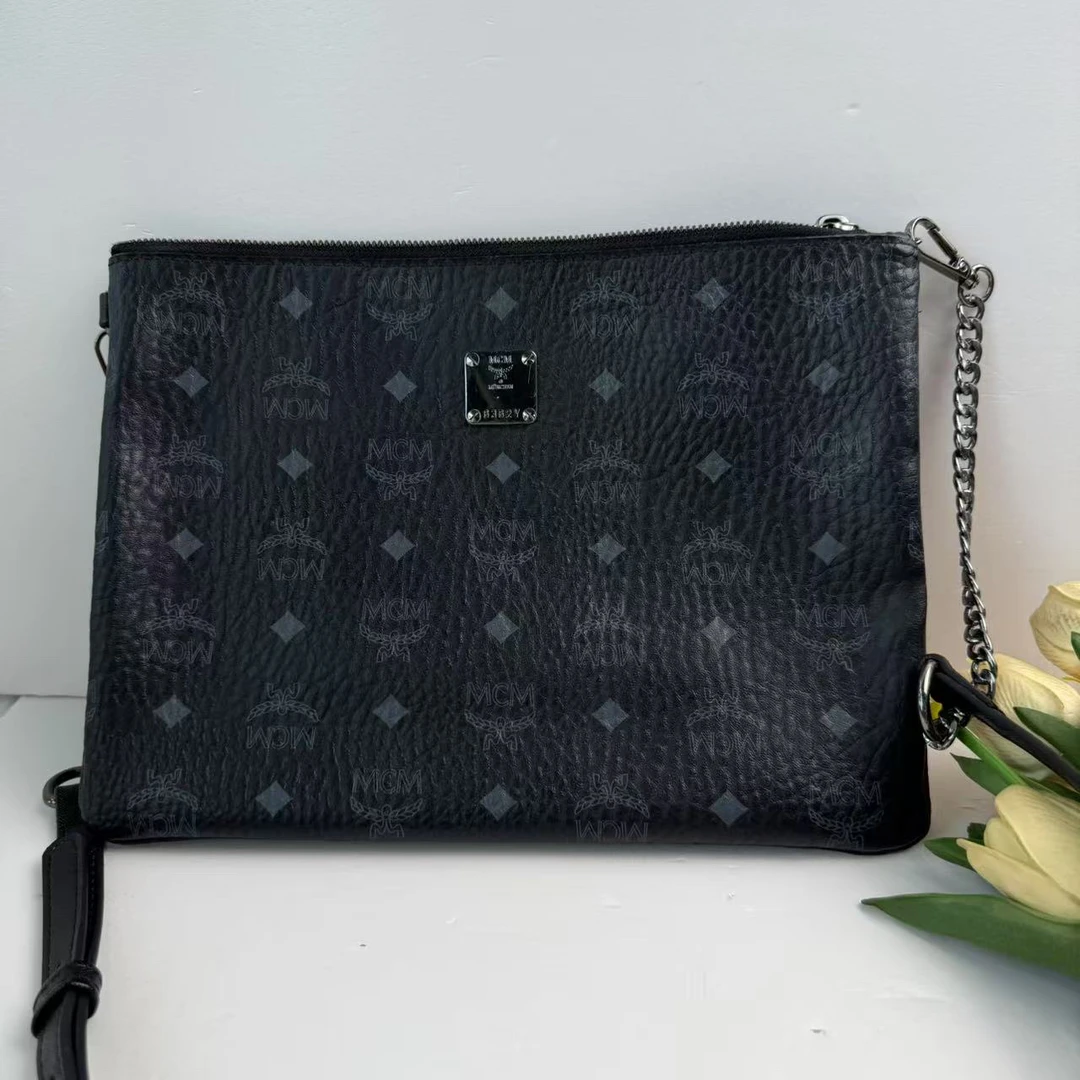 95新 MCM MCM黑色大手拿单肩包