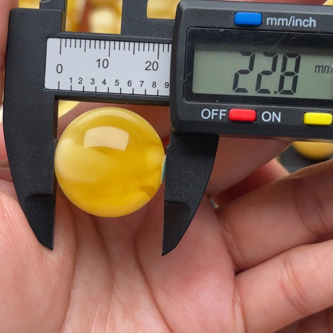 琥珀未镶嵌裸石蜜蜡圆珠笑