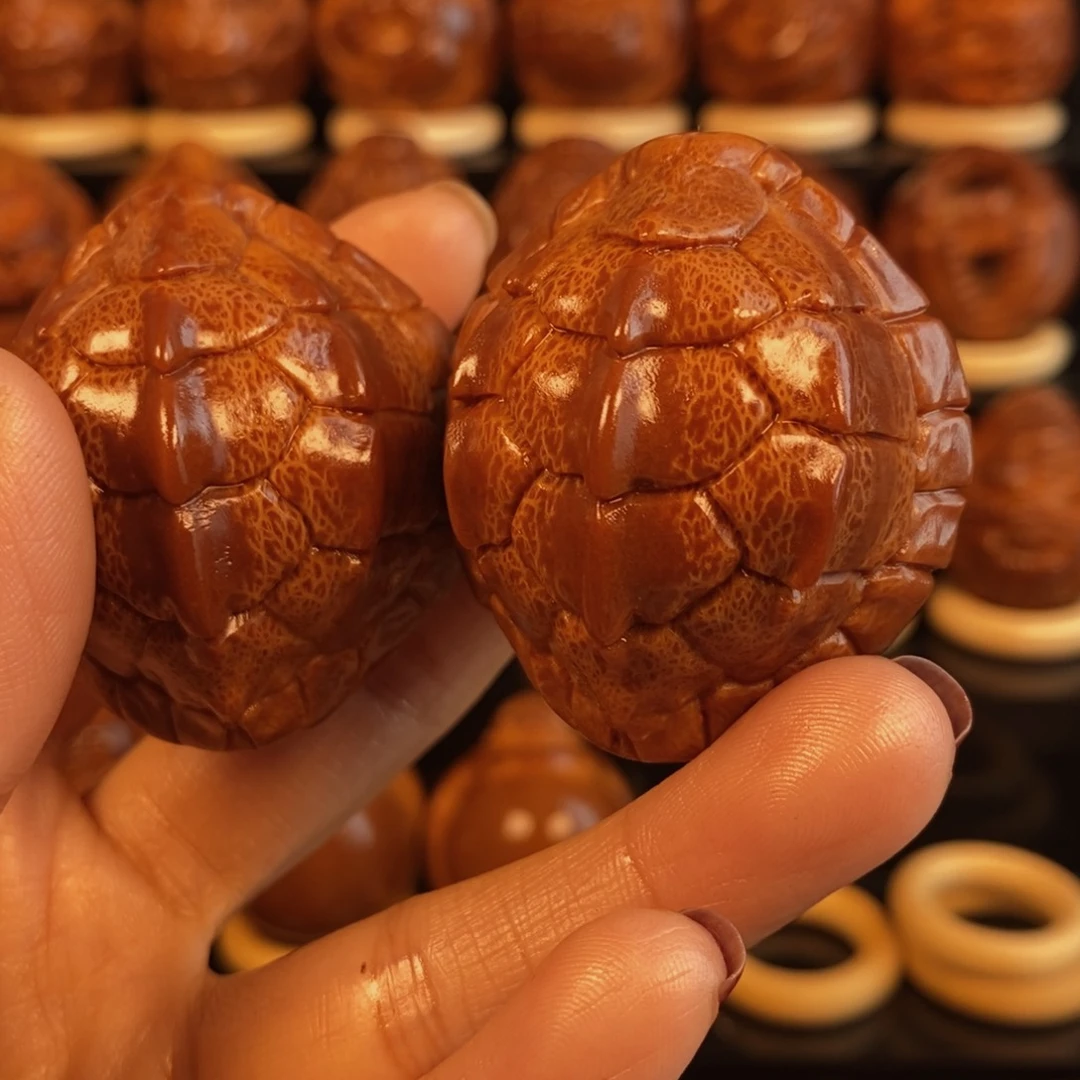 橄榄核吊坠济****烤龙脊富甲一对40000006