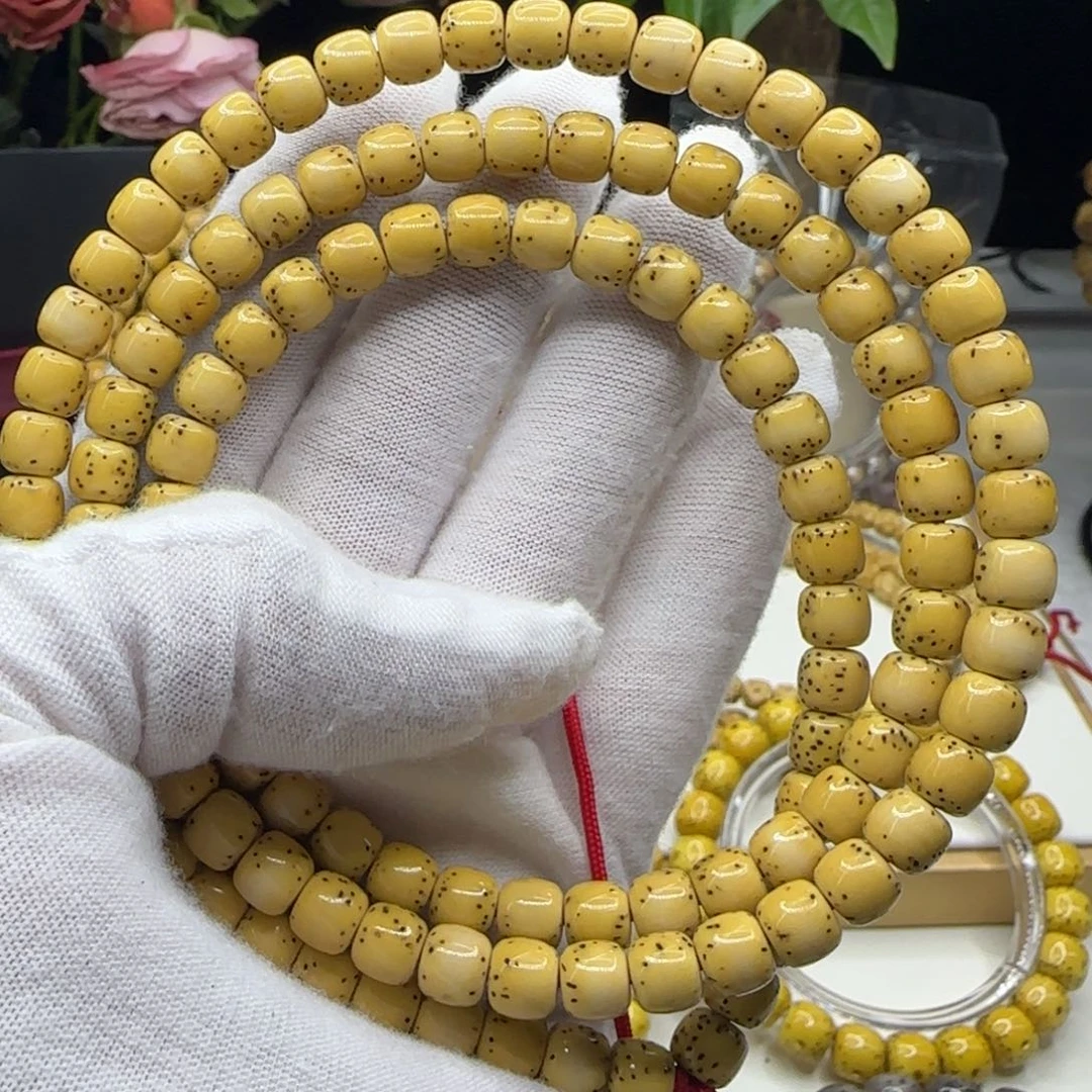 手串星月菩提鸡油黄通体大留白7×6-108同枝果b2