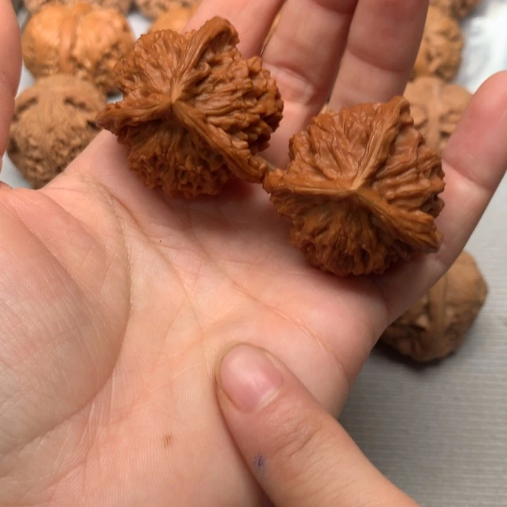 秦***弓文玩核桃把件盘山三棱