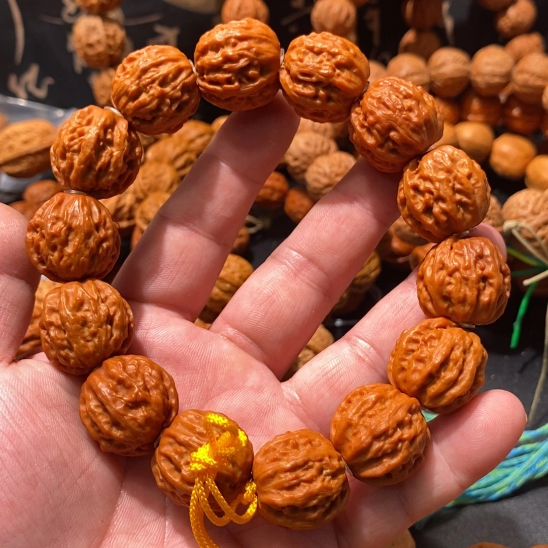 晨***曦木质类核桃粗筋手串