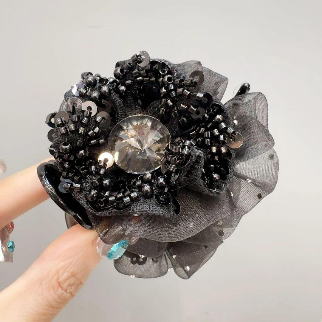 F872高级嘻嘻款黑色马尾夹