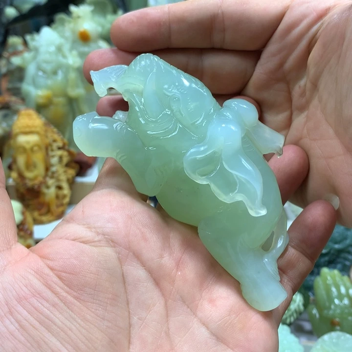 李***春蛇纹石玉未镶嵌手把件