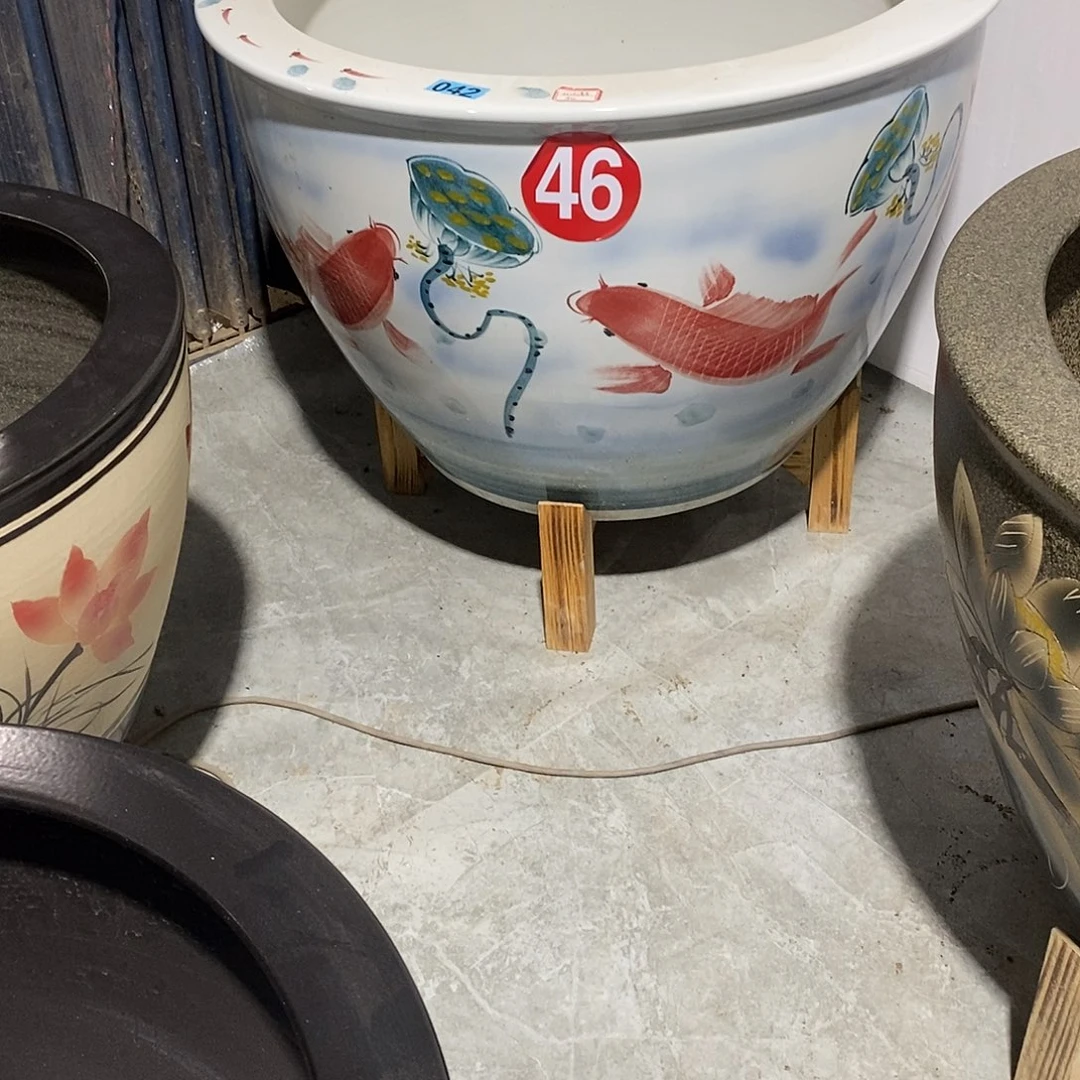 景德镇陶瓷鱼缸艺术张**?