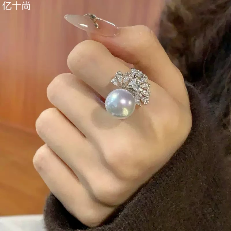 925银合成锆石戒指 亿十尚水滴羽白珠纯银戒指轻奢时尚洋气不掉色