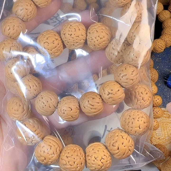 梦***河桃核吊坠两条桃核手串