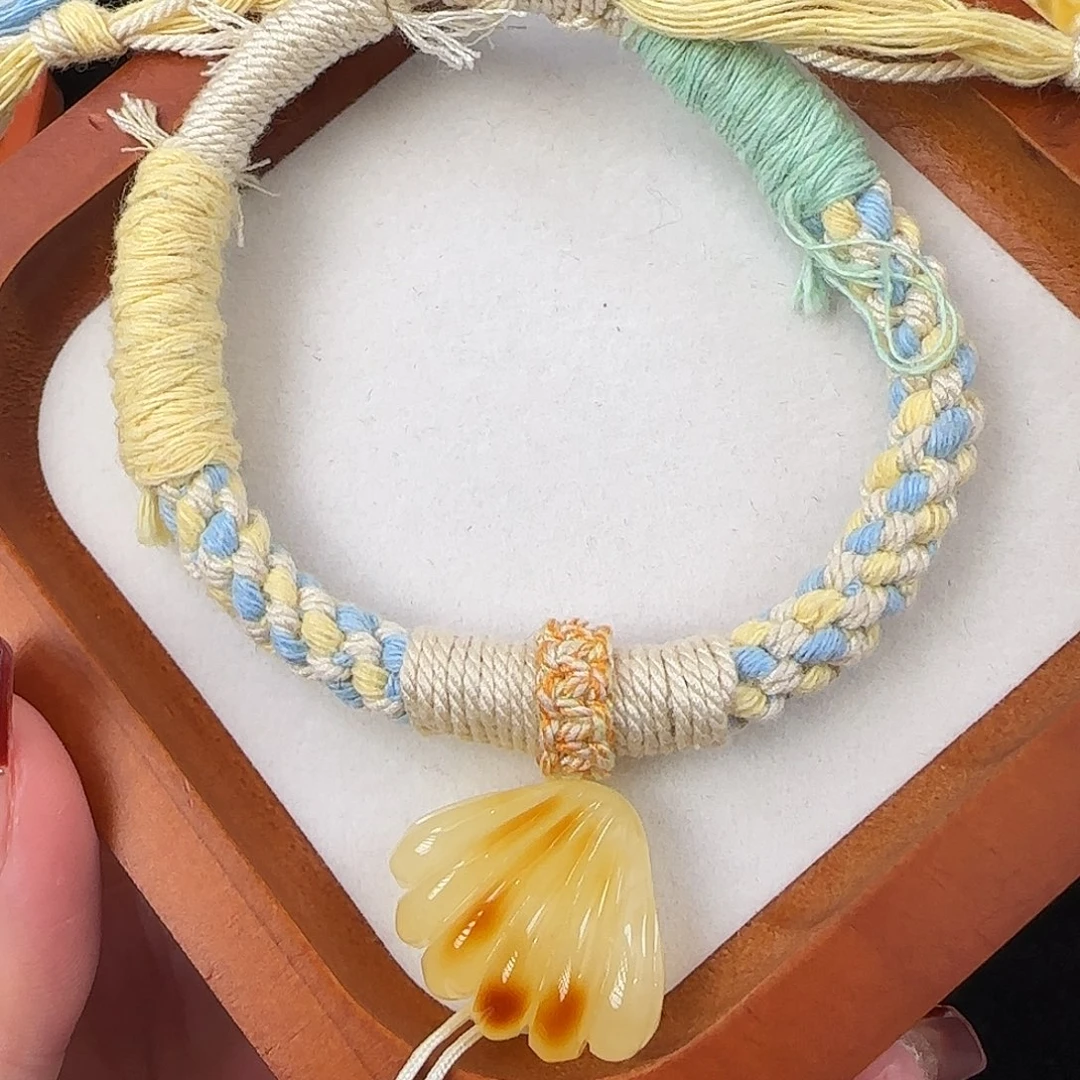 琥珀珠宝奇石未镶嵌张****?