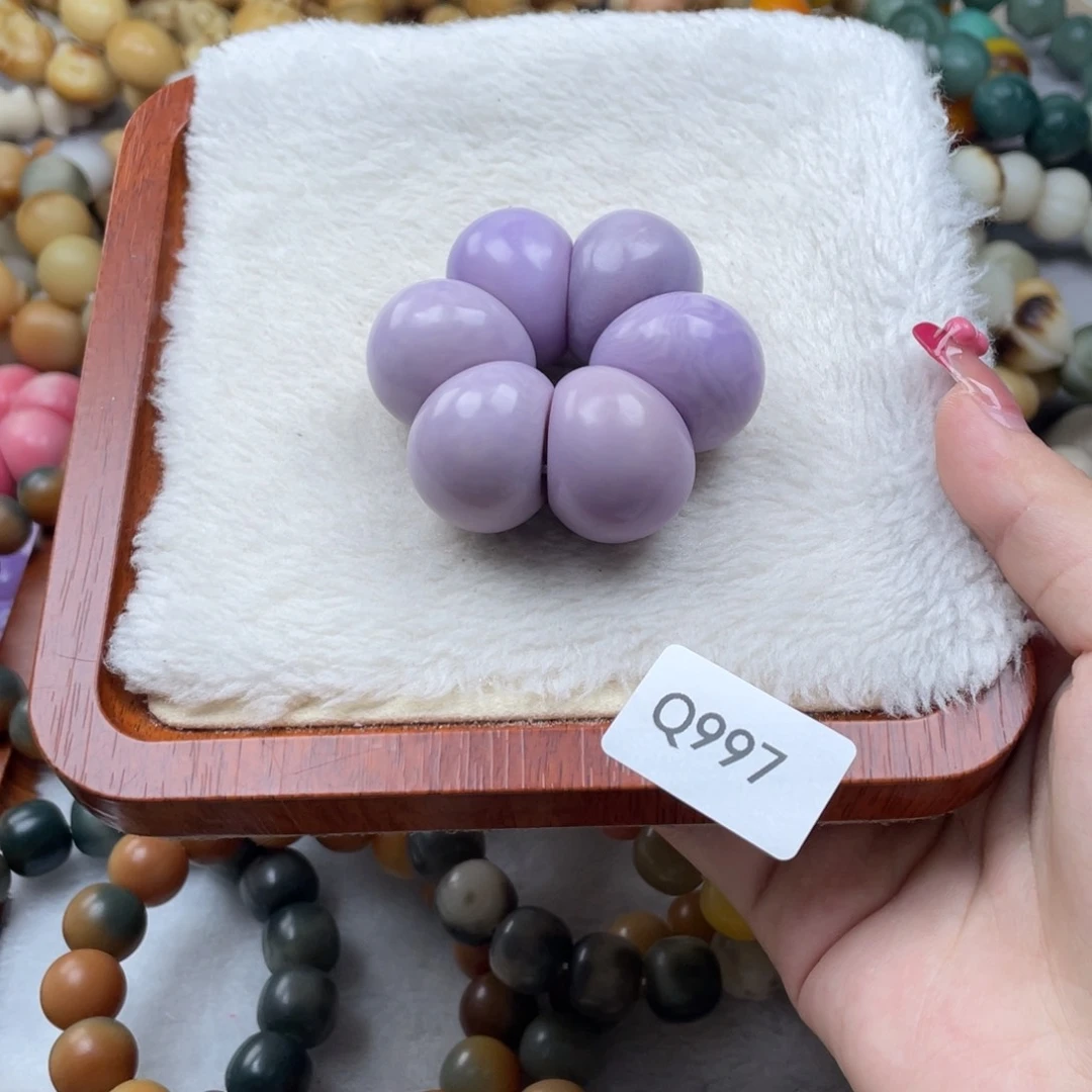 沐***子菩提根/象牙果吊坠瑕Q997蒜瓣手捻24mm一串