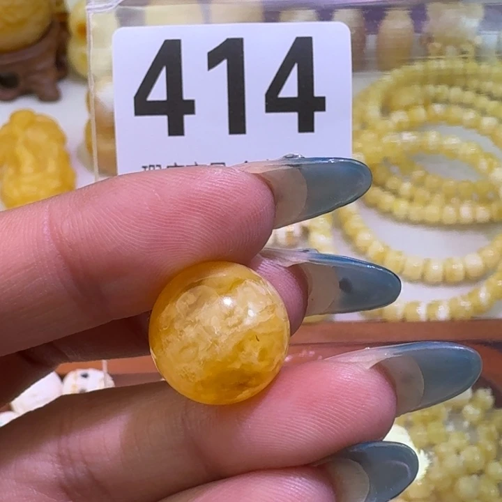 楽****琥珀未镶嵌裸石15.3皮色点