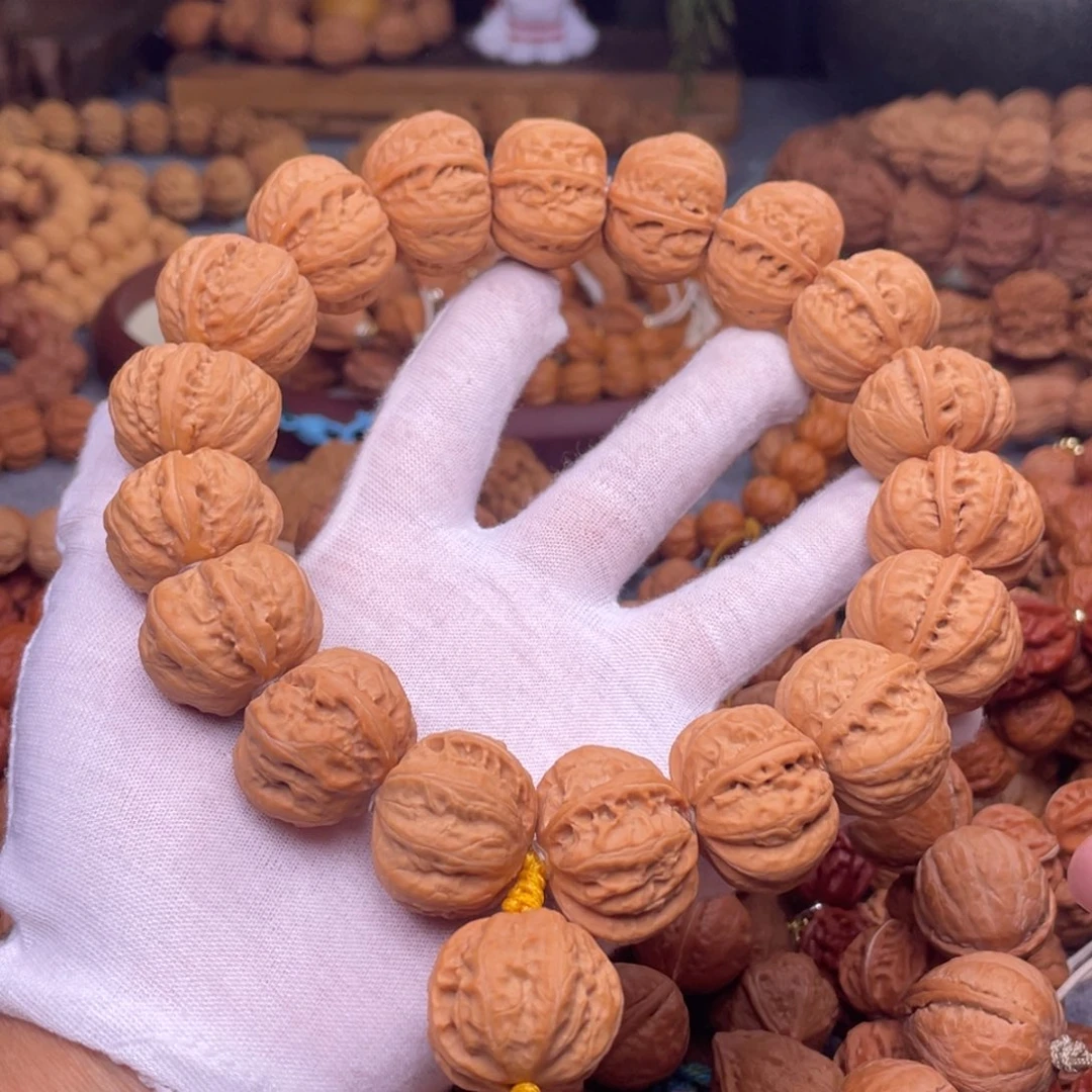 旭***光文玩核桃手串秋子